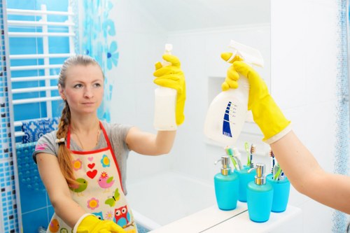 Professional oven cleaner in Hampstead cleaning a greasy oven interior
